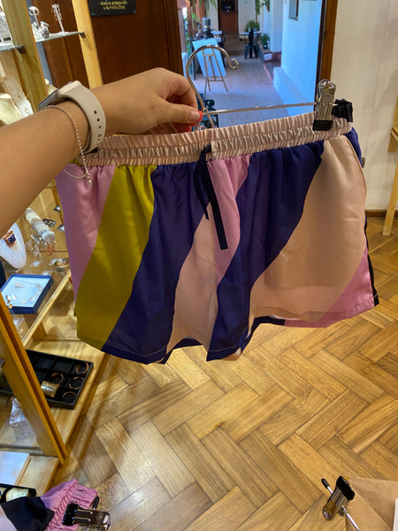 Short plisado